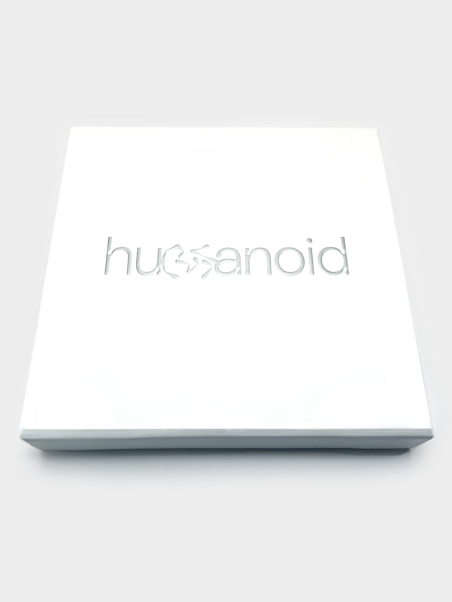 Close up of the humanoid logo on the white box containing the Trial Bundle